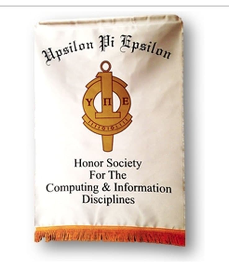 A cream Upsilon Pi Epsilon chapter banner with gold fringe and the society crest.